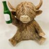 Highland Cow Holding A Beer Bottle