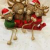 Family Of Highland Christmas Cows With Dangly Legs
