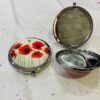 Lots Of Stemmed Poppies On A Magnifying Mirrored Compact