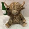 Highland Cow Ornament Holding A Bottle