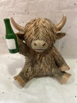Highland Cow Ornament Holding A Bottle