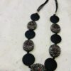 Floral Print With Black And White Ripple Effect Disc Detail Long Necklace