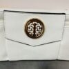 White, Light Beige, Or Gold Cross Body Bag With Large Gold Disc Embellishment