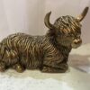 Bronze Laying Down Highland Cow