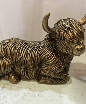 Bronze Laying Down Highland Cow